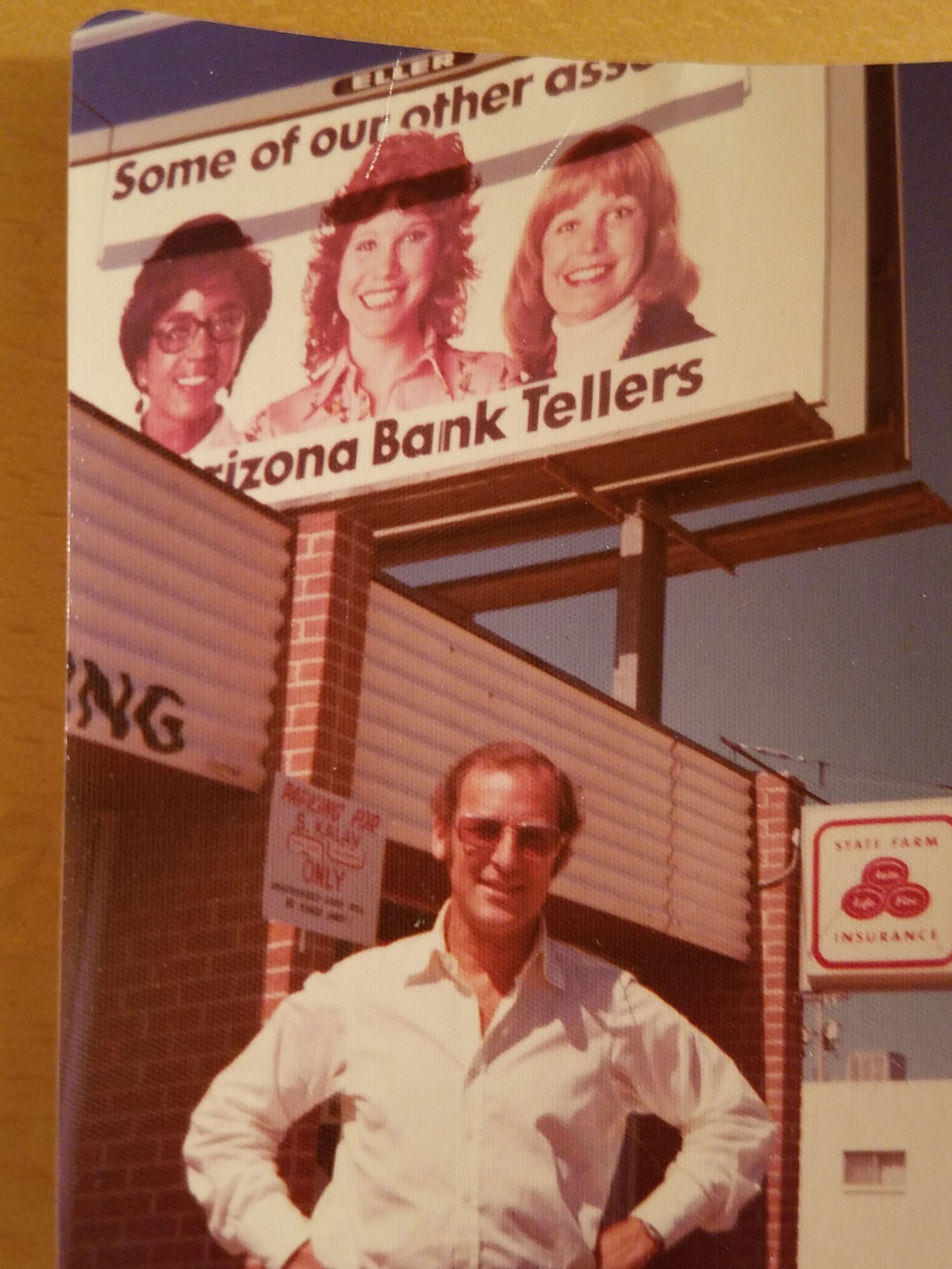 Barkin's father posed outside a billboard in Arizona featuring his daughter.