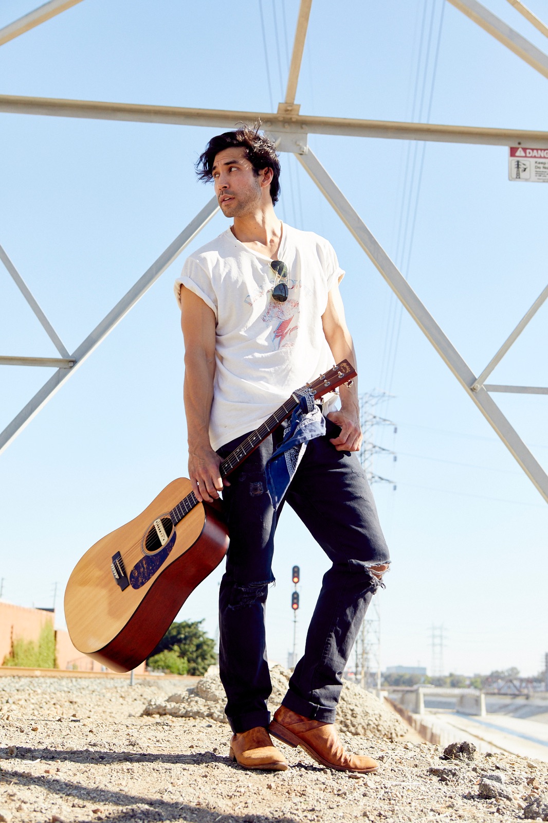 Rayford with his acoustic guitar